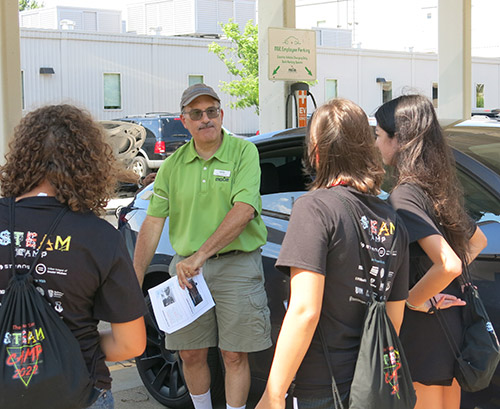 STEAM Camp participants discuss electric vehicles