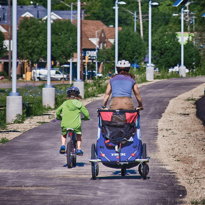 Family bike ride on a bike path