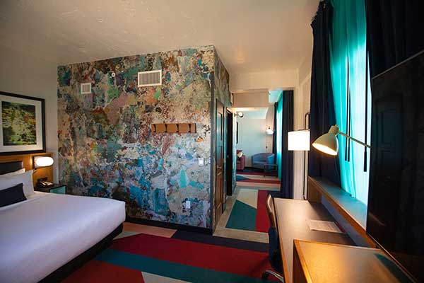 Hotel Indigo's nearly 150 guest rooms, hallways and common areas celebrate the city's history with artistic features and decor.