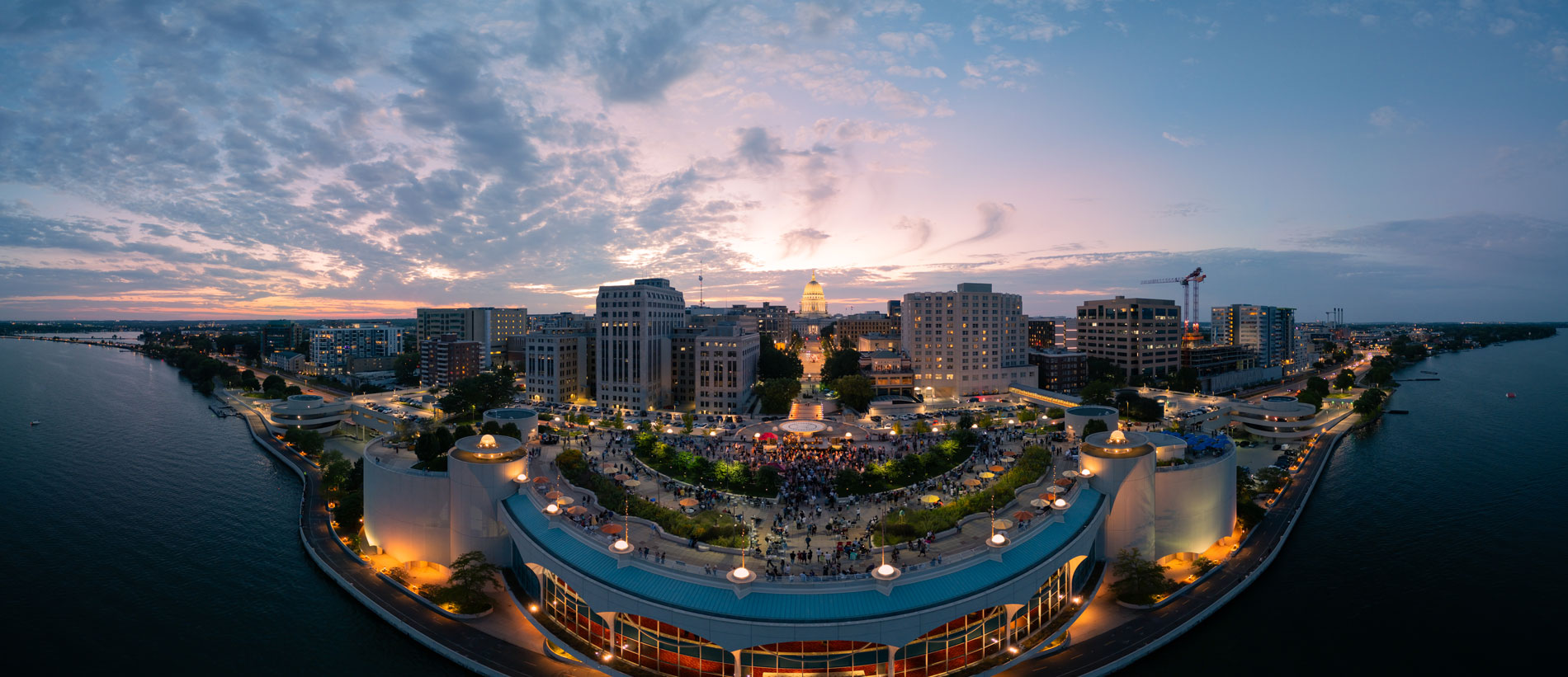 Madison, Wisconsin, aerial fisheye view of downtown, the lake and the Capitol on a summer night