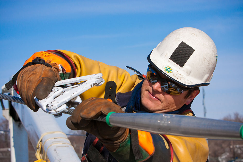 MGE lineworker in training.