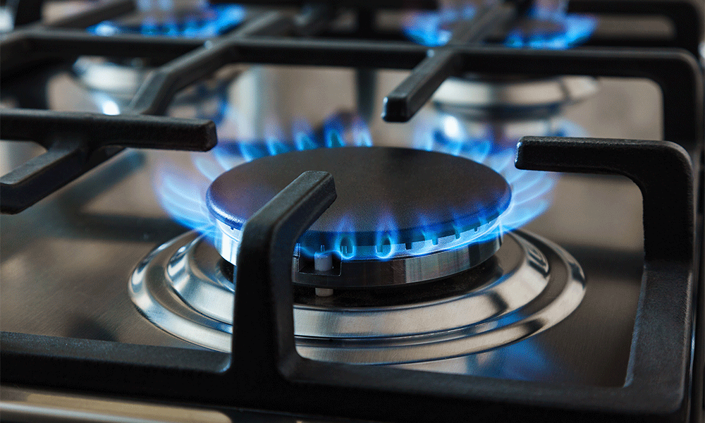 Lit pilot on gas burning stove