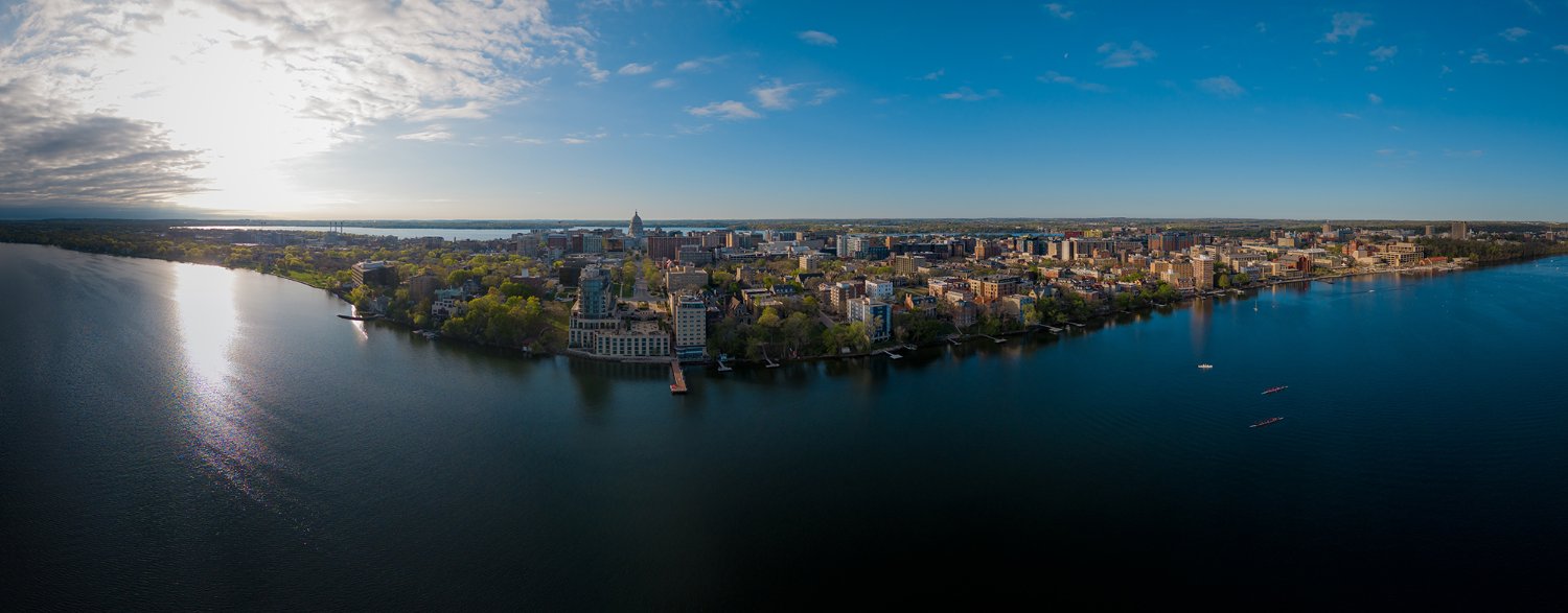 Aerial view of Lake Mendota and Madison skyline.