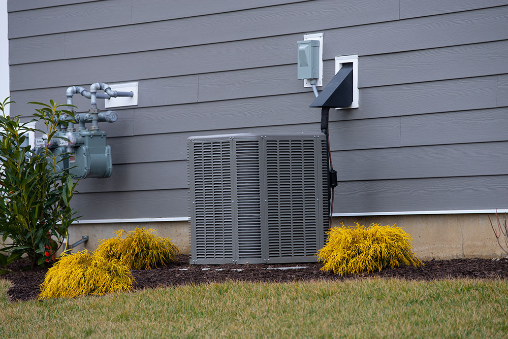 new central air conditioning unit outside of home