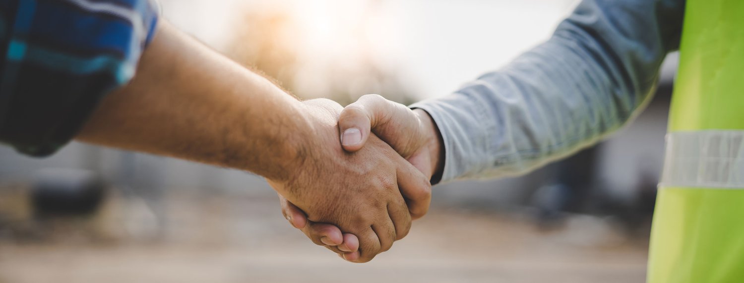 Contractors shaking hands.