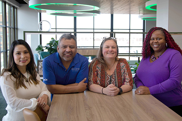 MGE's Energy Experts seated at a table